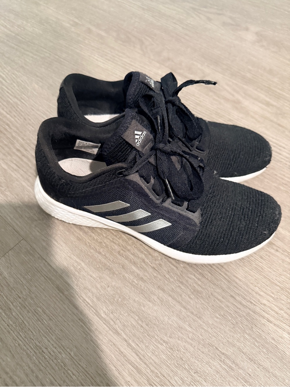 Adidas Black Running Sneakers with Silver Stripes